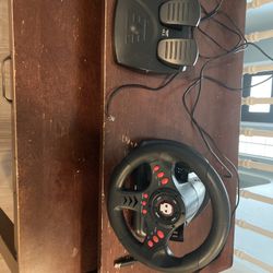 Racing Wheel And Pedals For Racing Or Driving Games
