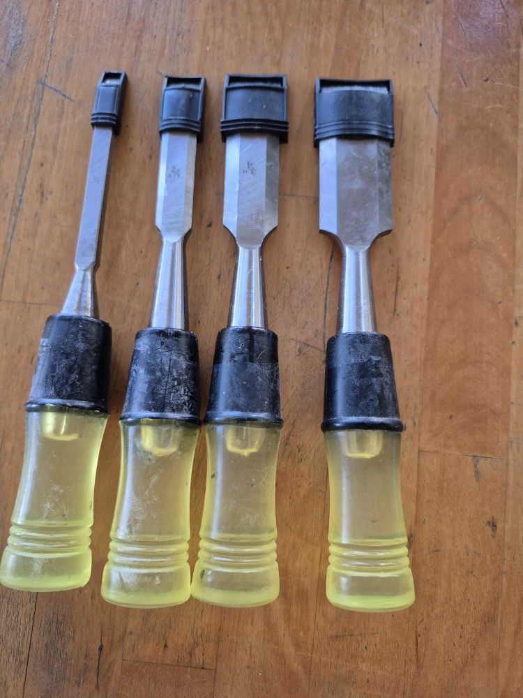 FOUR PIECE WOOD CHISELS