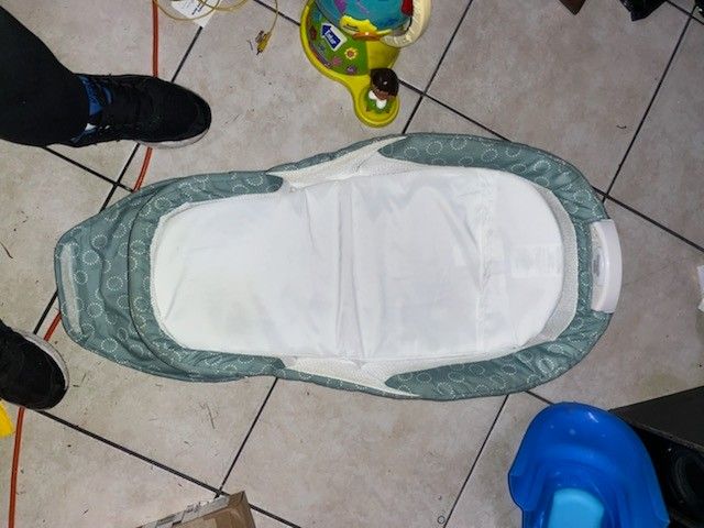 Snuggle Nest Infant Lounger.