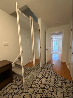 Pair of Mirrored Sliding Closet Doors (White Frame)