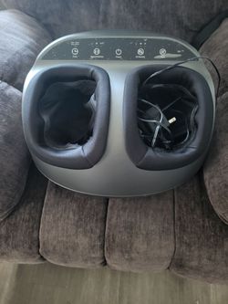 Heated foot massager