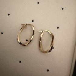 Arracada torcida oro italiano 10k