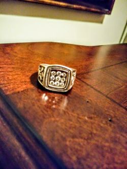 Custom made sterling silver ring with real diamonds