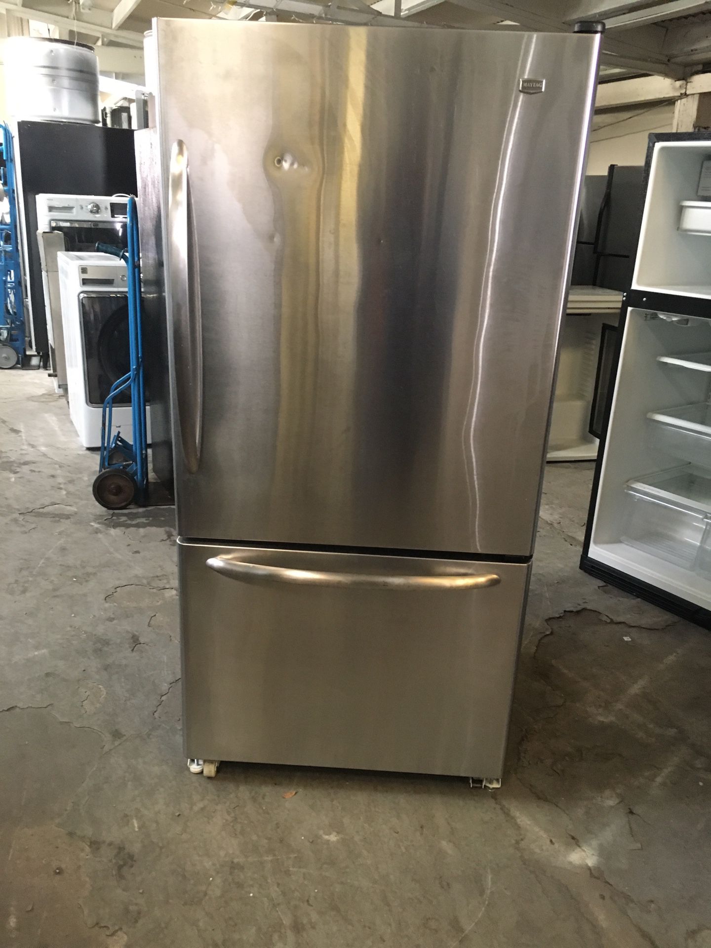 Refrigerator brand Maytag everything is good working condition 90 days warranty delivery and installation