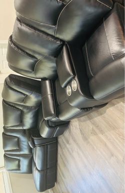 Black leather sectional with reclining