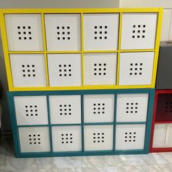 Yellow and teal storage cubes with white storage boxes   MOVING SALE ,IKEA SHELF UNITS ,VERY BEAUTIFUL LIKE NEW CONDITION  I HAVE 2 , EXACTLY IN THE P