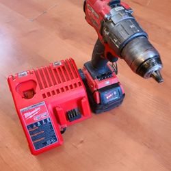 ~MILWAUKEE HAMMER DRILL WITH 5.0 BATTERY AND CHARGER IN EXCELLENT WORKING CONDITION~