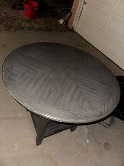 Round wood dining table for four ppl