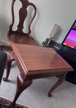 Antique swivel chair in perfect condition $60 Wooden table $30