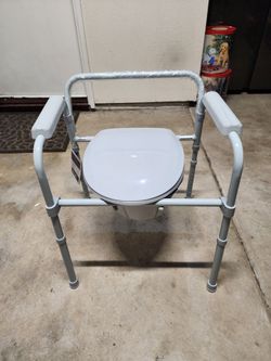 Drive Medical folding steel 3-in-1 bedside commode chair