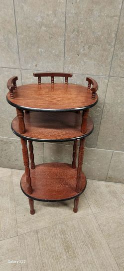 vintage three-tiered wooden telephone stand