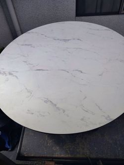 Marble top table and wool like covered chairs