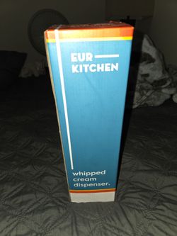Whipped cream dispenser