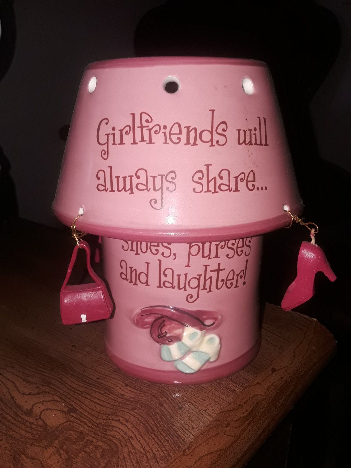 Pink lamp-like candle holder. 6" high
