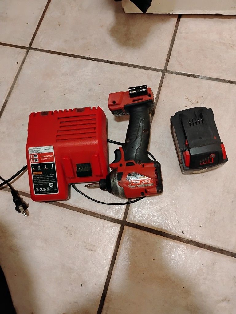 Milwaukee Impact With Charger And Battery 18 Volts