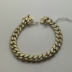 CUBAN BRACELET 10KT YELLOW GOLD, 8” LENGHT, 59.2 GRAMS, 10.6 MM. 