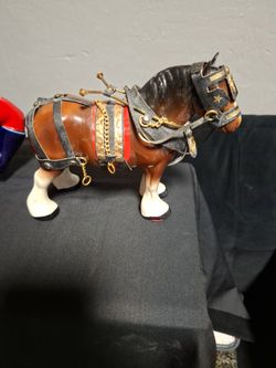 This vintage ceramic Clydesdale horse figurine