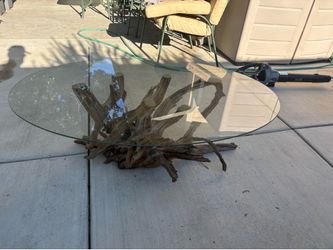 root wood glass-top coffee table.