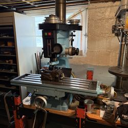 MILLING AND DRILLING PRESS MACHINE WITH VARIOUS ADAPTERS. BUYER MUST DISASSEMBLE,PICK UP AND DELIVER. $500.00 OR BEST OFFER.