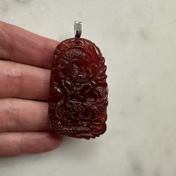 Carved carnelian, Chinese dragon, stone pendant