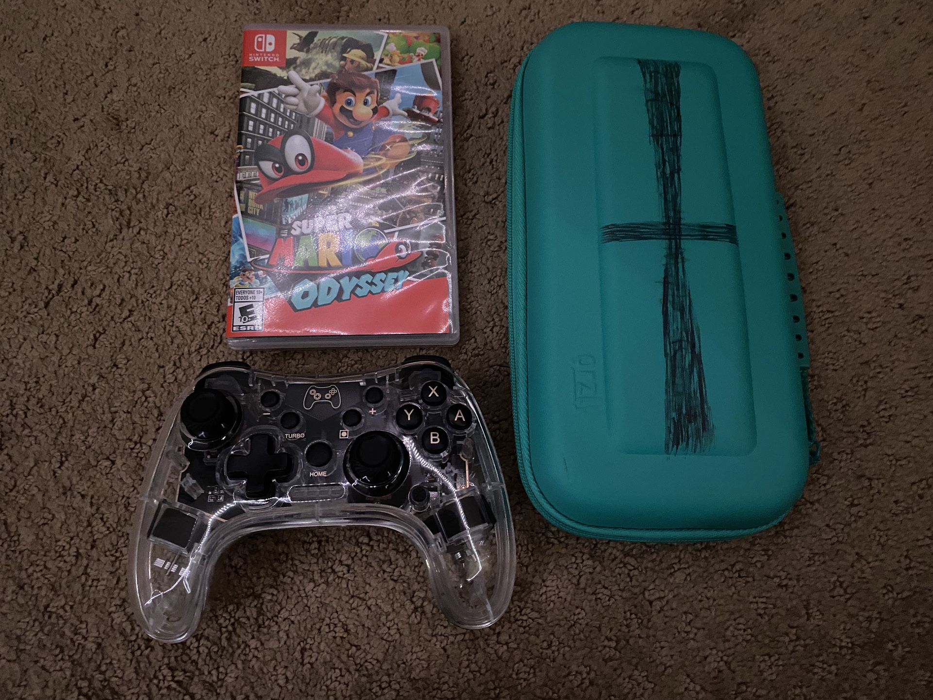 Cyan Nintendo Switch Lite - Case, Controller, and Super Mario Odyssey Included