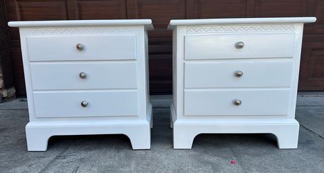 Two white 2-drawer nightstands