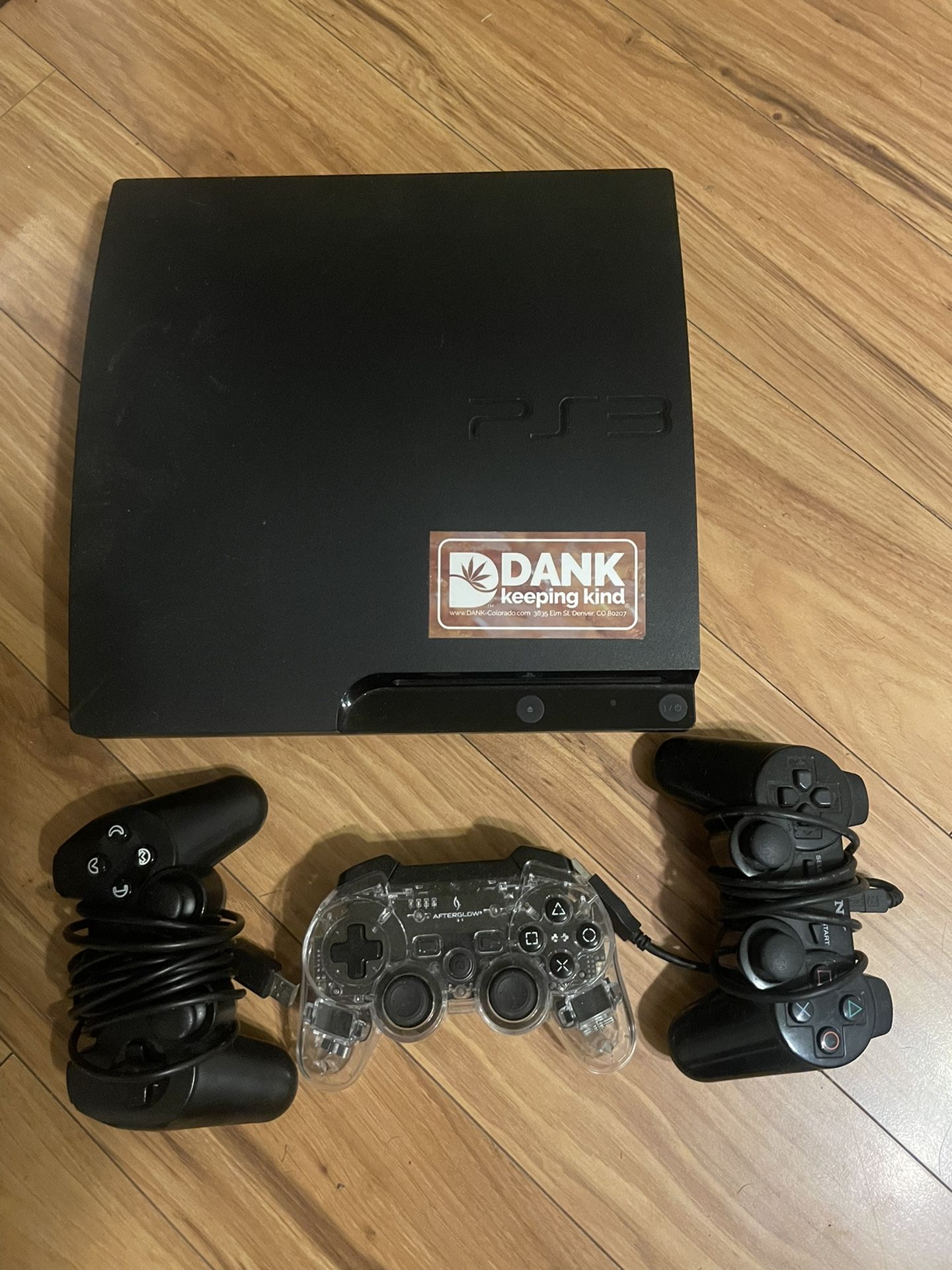 PS3 Console And All Connections. Comes With 1 Corded Controllers And 1 Wireless Controller 