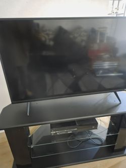 Smart TV with TV Stand – Great Condition