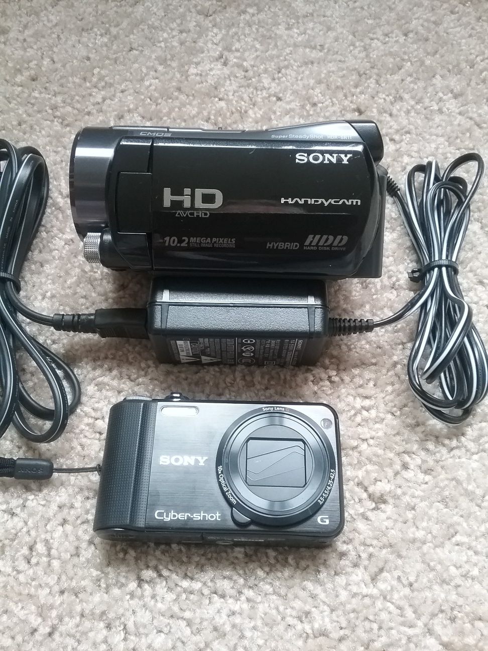 SONY HD HANDYCAM and SONY CYBERSHOT 16.2MP CAMERA BUNDLE.