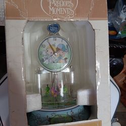Precious  moments anniversary  clock 2011