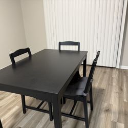MOVING SALE —Table And Chairs (4 Chairs)