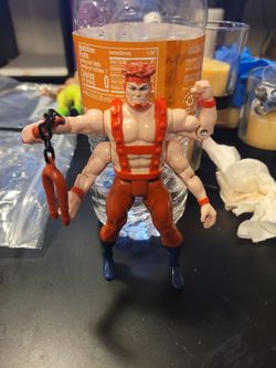 X man action figure forearm