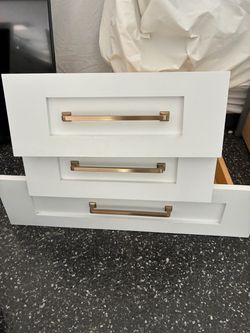 White shaker upper and lower cabinets and maple cabinets!
