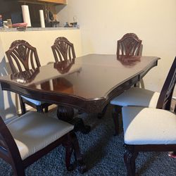 Table and 6 chairs 