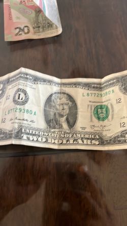 2 dollars and 20 pesos
