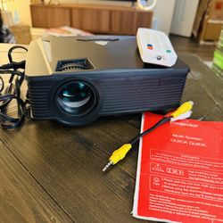 Wi-Fi Mini Projector — $35 (Good Condition)