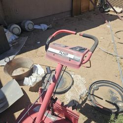 Huskee 18" Rear Tine Tiller with a 5HP engine