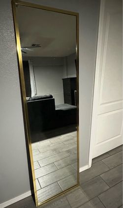 Tall gold mirror