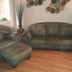 Sofa Trio In Good Shape, There Is A RIP On The Bavk Of The Chair(cover With A Throw)