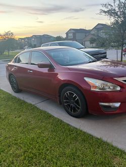Nissan Altima Red 4-Door Sedan