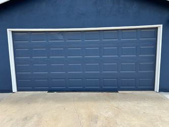 Garage door and garage door opener (2 remotes)