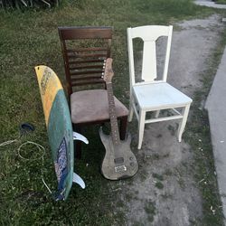 FREE- Out Front - Chairs, Guitar, Surfboard