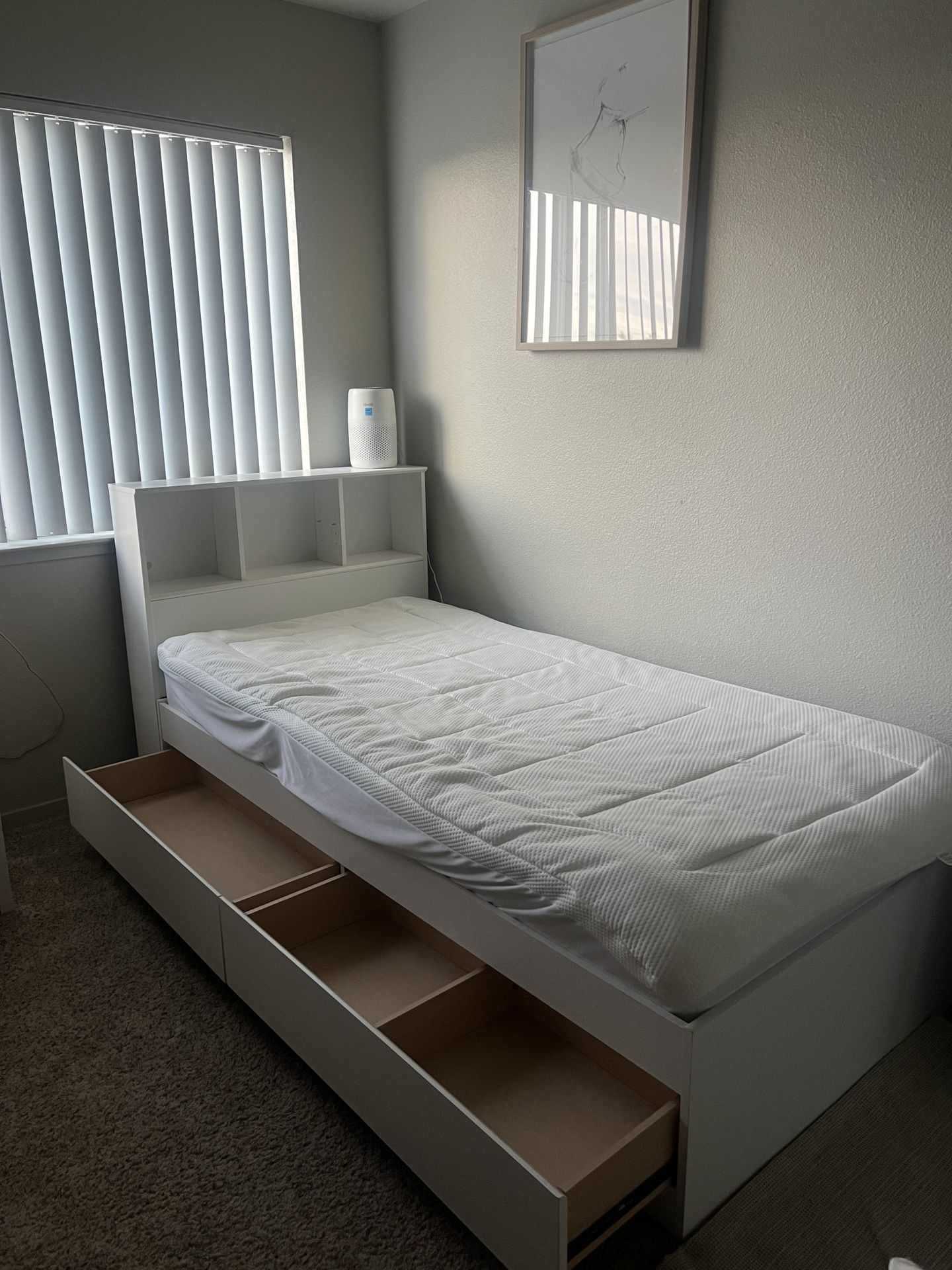 TWIN XL BED W STORAGE *Bedding included*