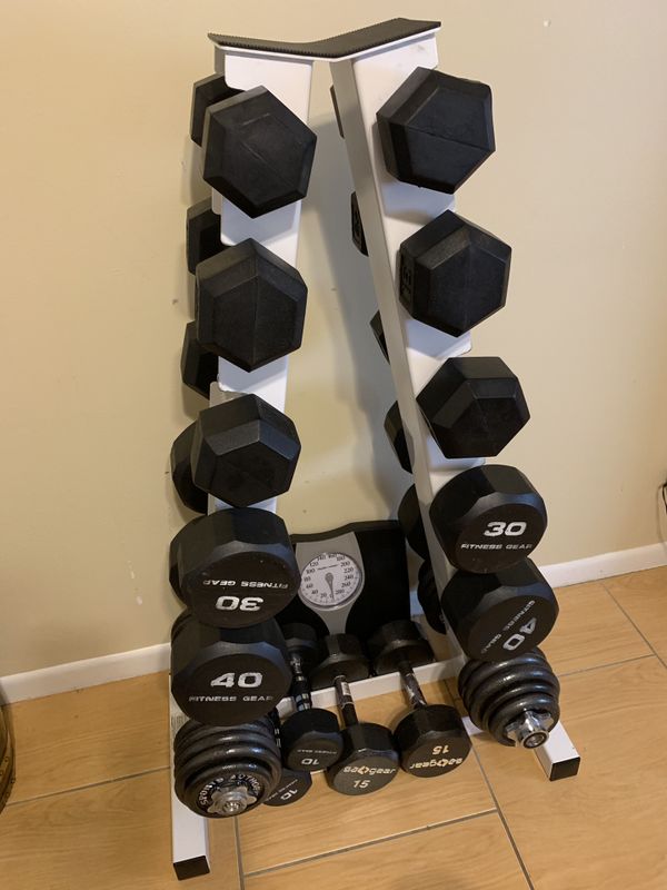 Dumbbells rack with all the dumbbells 10,15,20,30,40 and 50 lbs . for