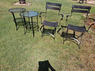 2 unique wooden chairs & 2 glass top round iron tables