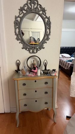 Cabinet and mirror