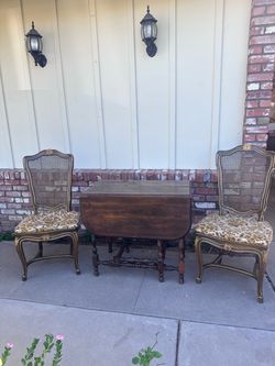 Vintage Drop-Leaf Table with Two Cane Back Chairs