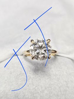 3 carats plus round laboratory diamond, USED.