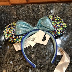 Disney Minnie Mouse Sequin Headband.  Brand New With Tags Never Worn .  Smoke free home 