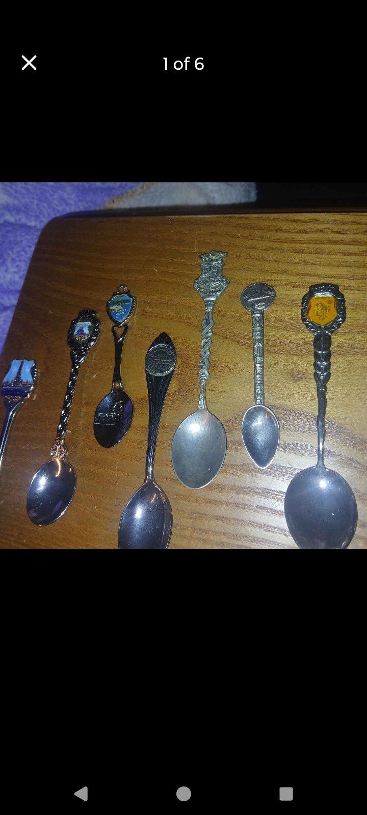 11 Collectors Spoons